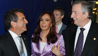 Urribarri negocia en NY con los Kirchner retenciones cero para el arroz